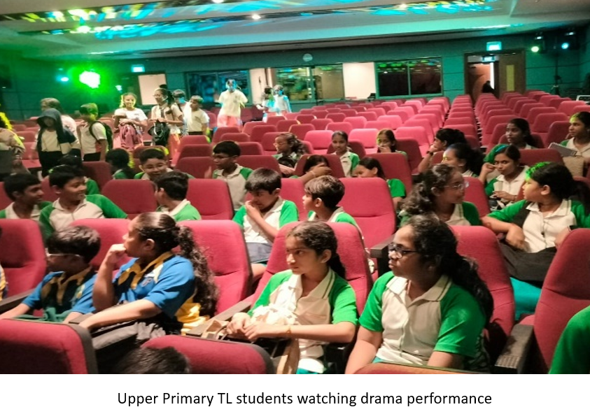 Upper primary TL students watching drama performance.